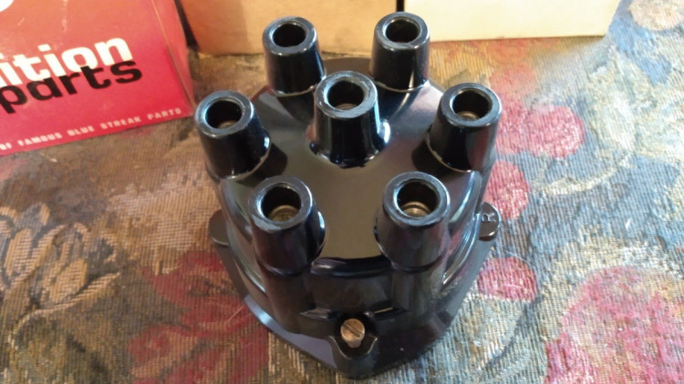 CAP-DISTRIBUTOR